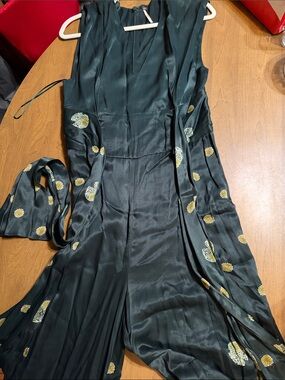 Free People Black Satin jumpsuit with Pale Yellow Size Ribbon